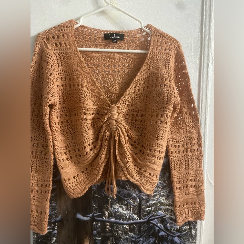 Women’s coral knit sweater. Size XS. Good condition, lightly worn.